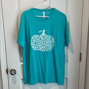 Teal T-Shirt with White Pumpkin Design